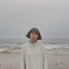 覃        馨